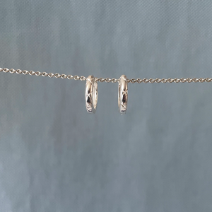 boucles d'oreilles croix griffées